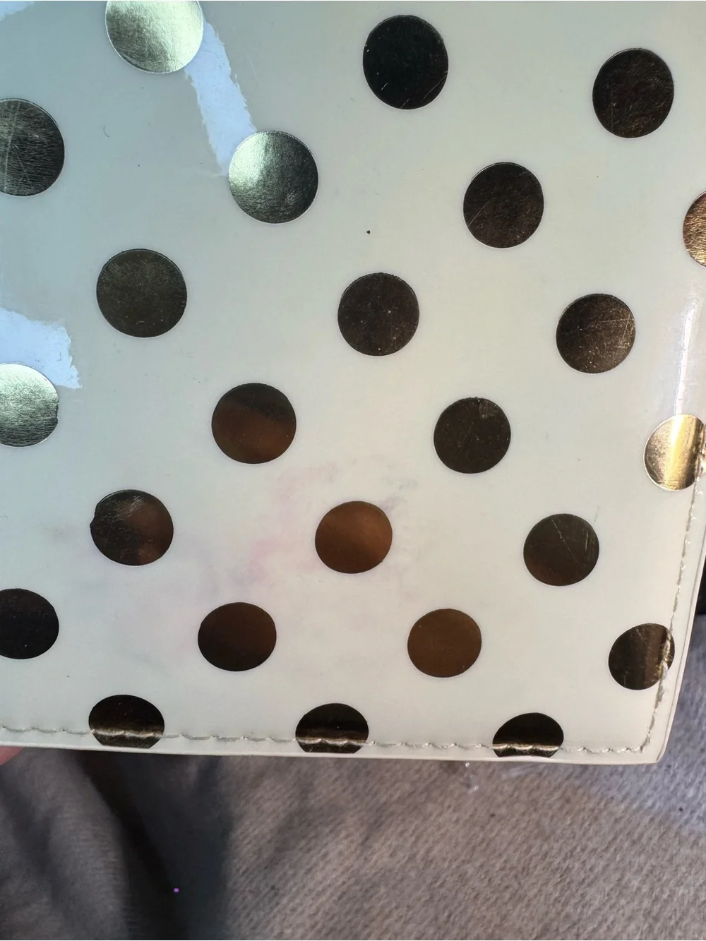 kate spade cream clutch with metallic gold polka dots